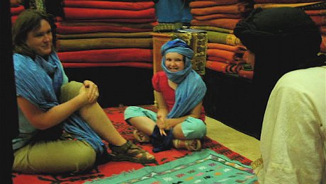 Family-holiday-Morocco-haggling-carpets
